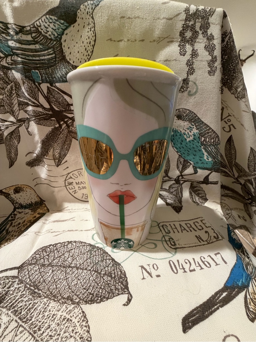 Starbucks Ceramic Tumbler with Yellow Lid and Teal Sunglasses Graphic